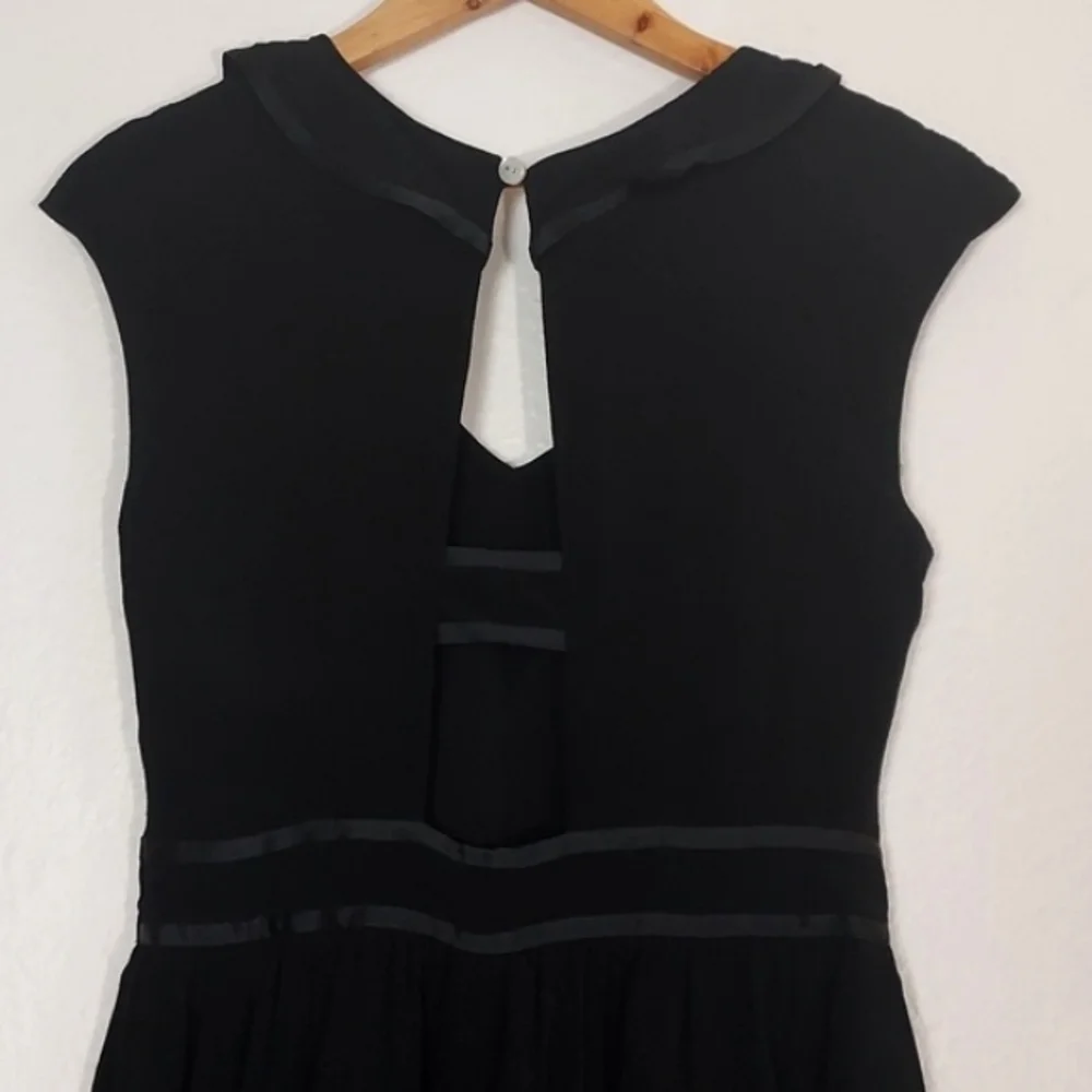 Anthropologie Romper Ruffled Black Size 6